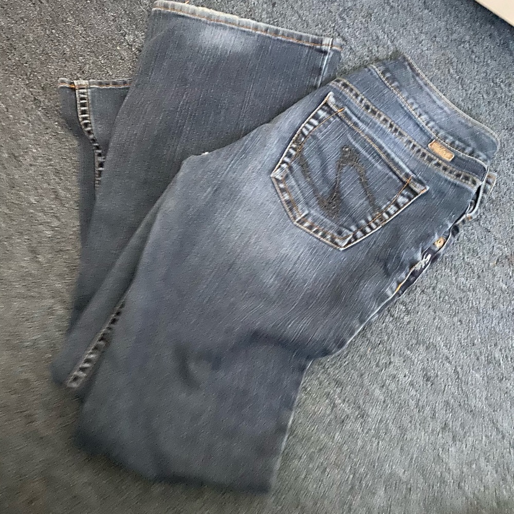 Women’s Silver Suki mid rise jeans.